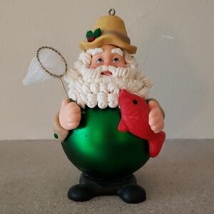 Santa Fisherman Ornament with Red Fish